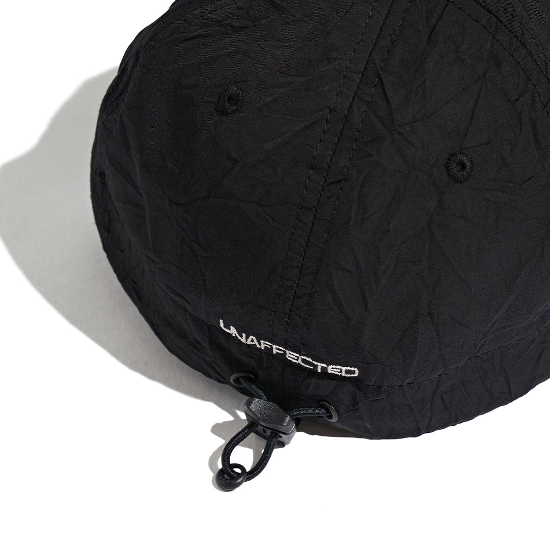 UNAFFECTED UN-FW21BC02 SLOGAN DRAWSTRING BALL CAP- BLACK