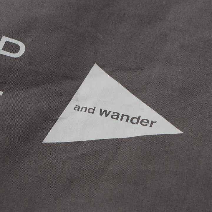 AND WANDER inside tarp