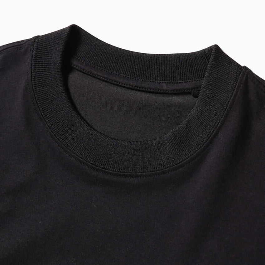 AND WANDER pocket T black